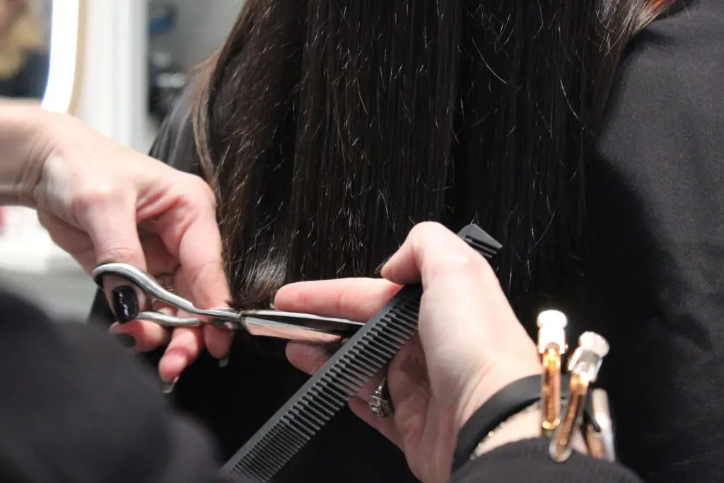 a cut on a client hair model for the associate program