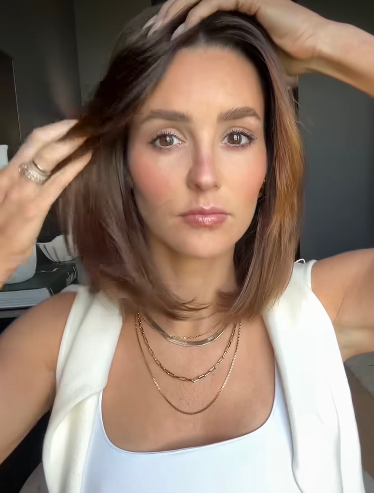 Result: Smooth, polished hairline with face-framing layers laying correctly